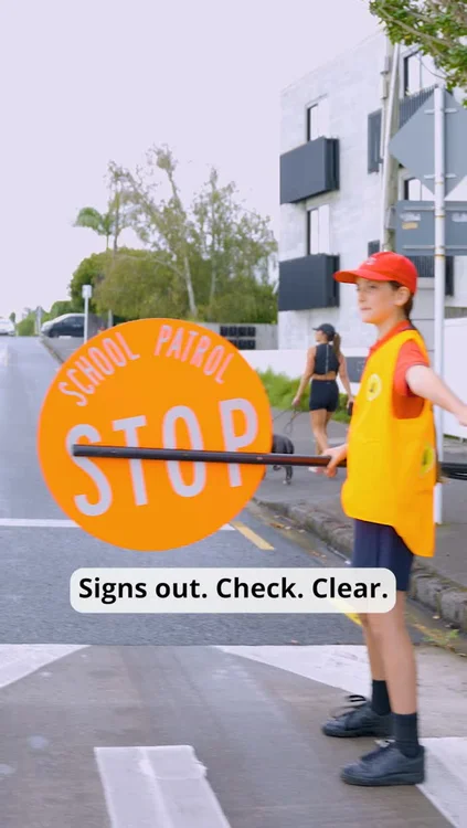 Signs out. Check. Clear. Cross now! 🟠 School drop off and pick up times bring a huge number of cars, buses, bikes, scooters, and pedestrians to the roads near schools, making it very hazardous. This makes what our school road patrollers (like Ambra and Oliver from Kohimarama School) do to help to keep their classmates and communities safe extra important. 

What can you do? 
👉 Make sure you slow down near schools.
👉 Be on high alert for hazards. 
👉 Prepare to stop at crossings.

We're on the hunt for Aotearoa's Lollipop Legends, celebrating these incredible road crossing patrol teams and recognising the difference they make in our efforts towards safer roads - rain, hail or shine.  Encourage your school road patrol to enter for the chance to win one of two $10,000 grants to improve safety at your school, along with a special celebration event to recognise their contribution attended by rugby legend Renee Holmes! You'll find more info at the link in our bio #LollipopLegends