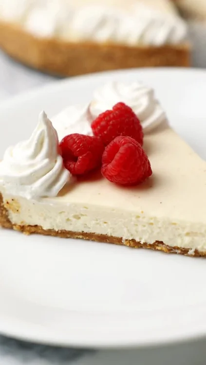 This easy no-bake cheesecake is one of my favorite spring desserts made with simple ingredients. #ad It’s refreshing and lightly sweet. Plus keto-friendly, sugar-free, and gluten-free with 10g protein per serving! Made with my favorite Vanilla Cream @ketochow , it’s a welcome dessert for any spring gathering.

Ingredients 
Graham Cracker Crust
2 cups almond flour (224 grams)
8 tbsp butter, melted (125 grams)
2 tbsp sugar-free granulated sweetener 
1/2 tsp cinnamon
1 tsp vanilla extract
1/4 tsp salt

Cheesecake
16 oz (2 blocks) cream cheese, very soft
4 oz (1/2 cup) sour cream, full-fat
1/2 cup vanilla protein powder (40 grams)
2 tsp vanilla extract
1 tsp lemon juice
2 tbsp sugar-free powdered sweetener (optional, adjust to taste)
1/2 cup heavy whipping cream, very cold

Instructions
Make the crust: Toast almond flour in a dry pan for 3 mins until fragrant. Optional, but recommended. Mix all ingredients until they look like wet sand. Press firmly into a parchment-lined or greased 9-inch springform pan. Use a flat-bottomed cup to pack it tight. Place in the freezer while you make the filling to lock in the butter.
Make the filling: Whip the cold heavy cream to stiff peaks. Set aside. 
Beat softened cream cheese, sour cream, Keto Chow, vanilla, lemon juice, and sweetener until silky smooth. Scrape the sides to ensure no lumps.
Gently fold the whipped cream into the cream cheese base using a spatula. Careful not to overmix - you want to keep that air.
Spread filling over the frozen crust and smooth the top with an offset spatula.
Chill: Cover and refrigerate for at least 6–8 hours (overnight is best).
Serve: Dip a knife in hot water and wipe dry between each slice.

#ketochow #ketochowpartner #ketodesserts #sugarfreedessert