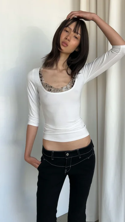 The Thompson Top is now online.

Three-quarter sleeves, a flattering scoop neckline, and considered details throughout.